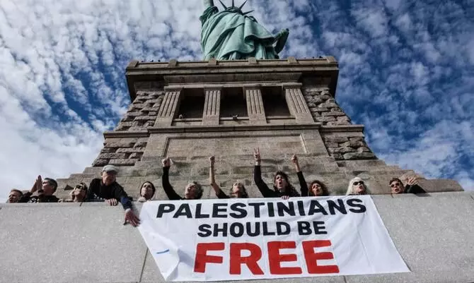 Jewish activists chant slogan that echoed during Holocaust for Gaza at Statue of Liberty