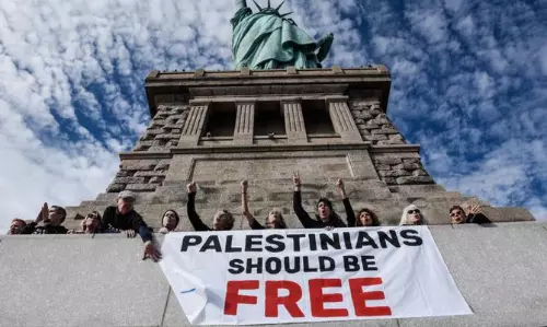 Jewish activists chant slogan that echoed during Holocaust for Gaza at Statue of Liberty