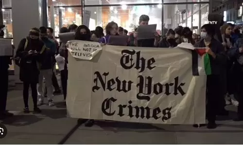 Mock newspaper labelled The New York Crimes’ says ‘We killed our colleagues