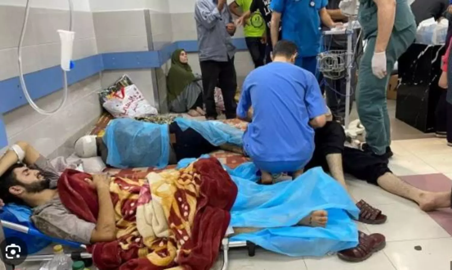 Some forced out at gunpoint as Israeli Forces order Al-Shifa Hospital evacuation