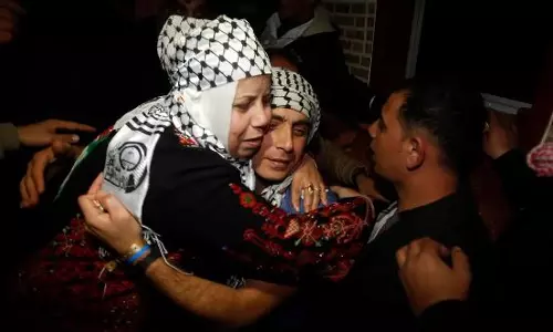 Emotional reunion for families as Palestinian prisoners return amid fragile ceasefire