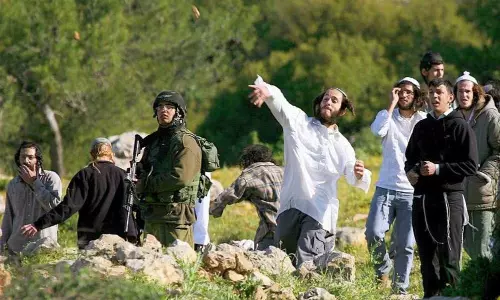 Israeli settlers kill Palestinian in West Bank as they attack Palestinian villages