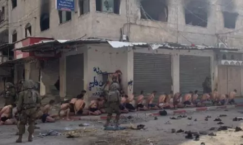 Video emerges of Israeli force parading Palestinians semi-naked