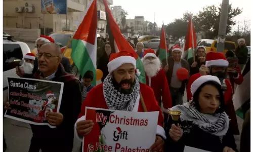 ‘Peace on earth means peace in Palestine,  Palestinian Christians forgo Christmas joy
