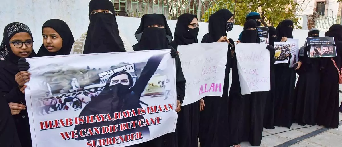 BJP accuses Siddaramaiah of appeasing PFI goondas by lifting hijab ban