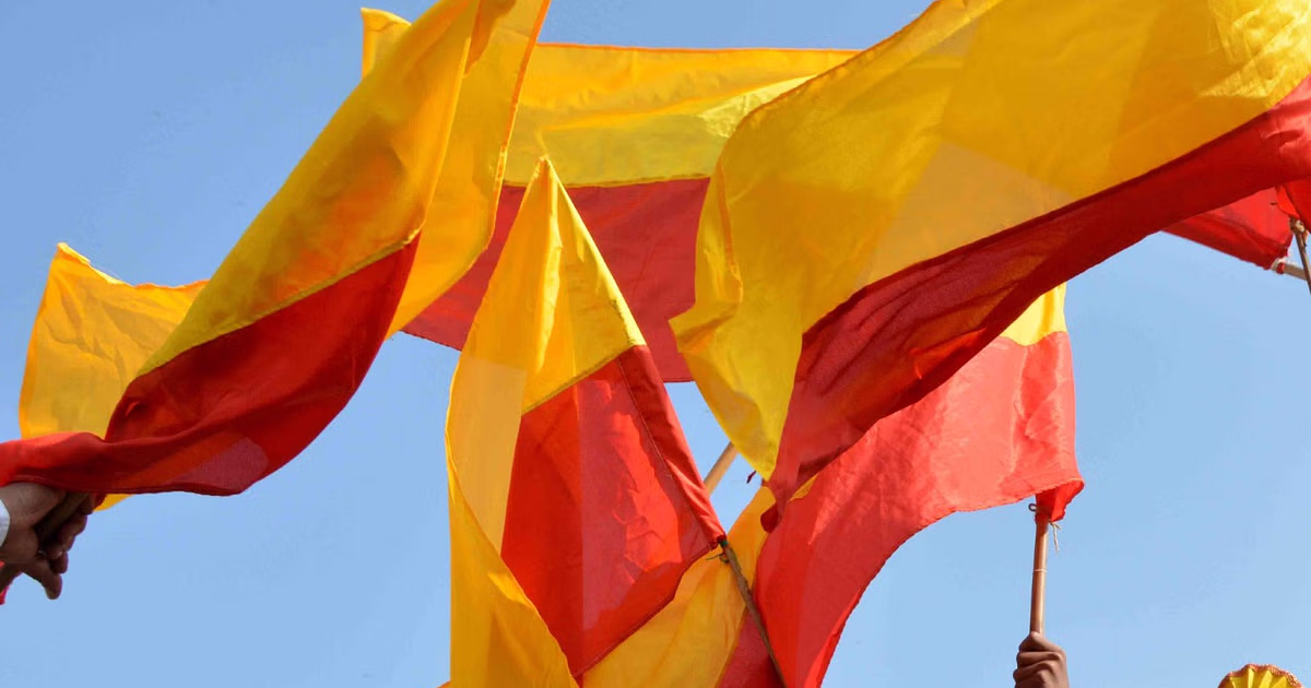 Tension in Karnataka after miscreants torch Kannada flag Tension in Karnataka after miscreants torch Kannada flag