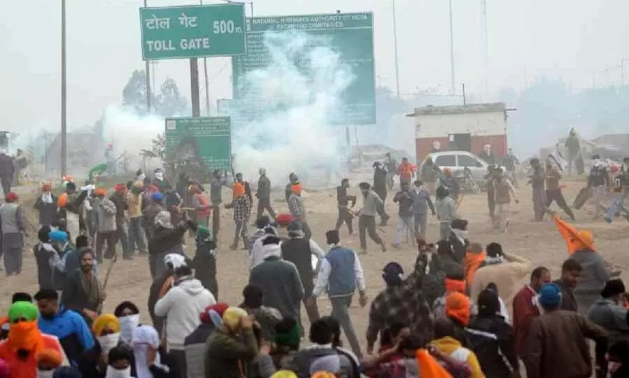 Delhi Chalo march: Teargas lobbed as farmers break Haryana barricades, pelt stones