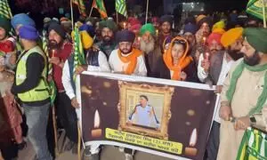 Protesting farmers hold candlelight marches on Punjab-Haryana borders