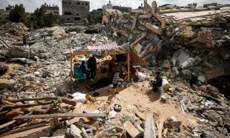 Israeli air strikes on Gazan refugee tents kill 11, wound 50