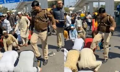 Delhi police officer suspended for assaulting men during Friday prayers, watch video Delhi police officer suspended for assaulting men during Friday prayers, watch video