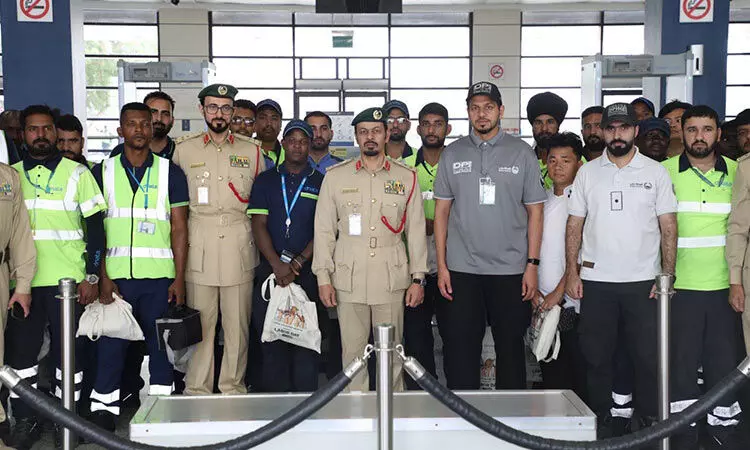 Dubai police honour DXB Airport workers