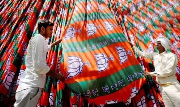 BJP uses party symbols in polling booths, threatens voters in Gujarat