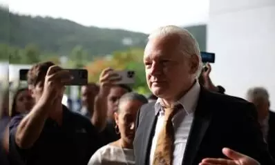 WikiLeaks founder Assange walks out of court as a ‘free man’