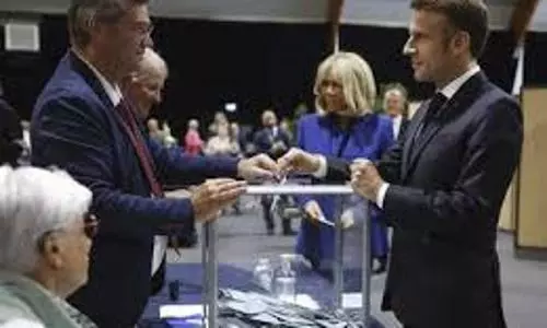 France heads for hung Parliament as left surpasses far-right in exit polls