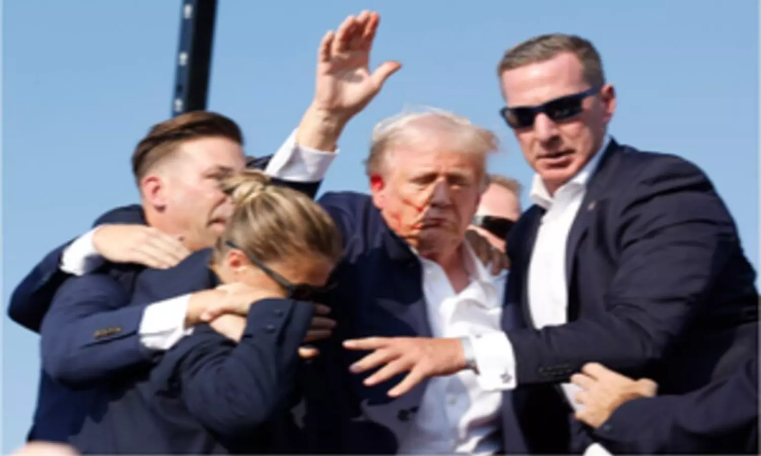 Unidentified assailant shoots at Trump in assassination attempt