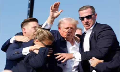 Unidentified assailant shoots at Trump in assassination attempt