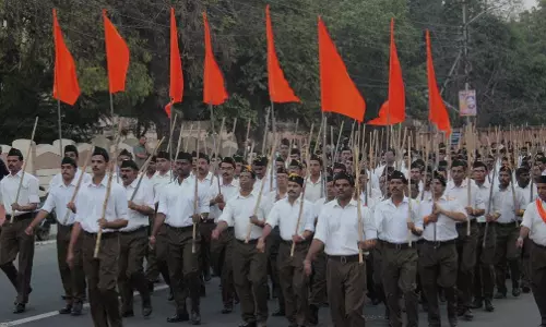 Modi Govt revokes ban on Govt employees participating in RSS activities