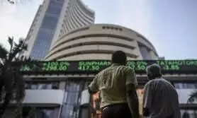 Sensex, Nifty closes at record high