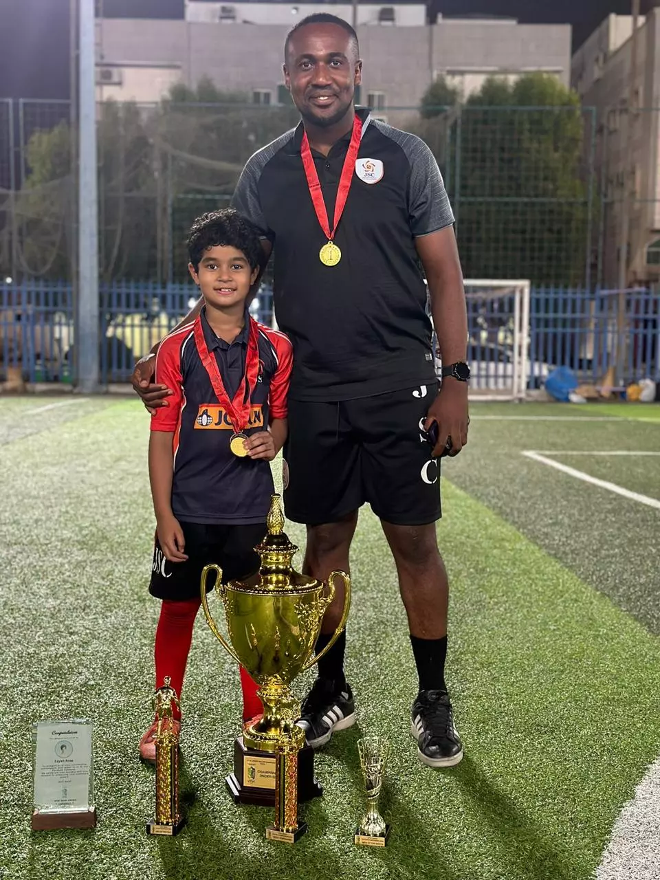 Eyzaan with coach Lima Joseph