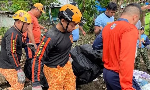 Flooding, landslides in Philippines leave at least 115 dead and missing