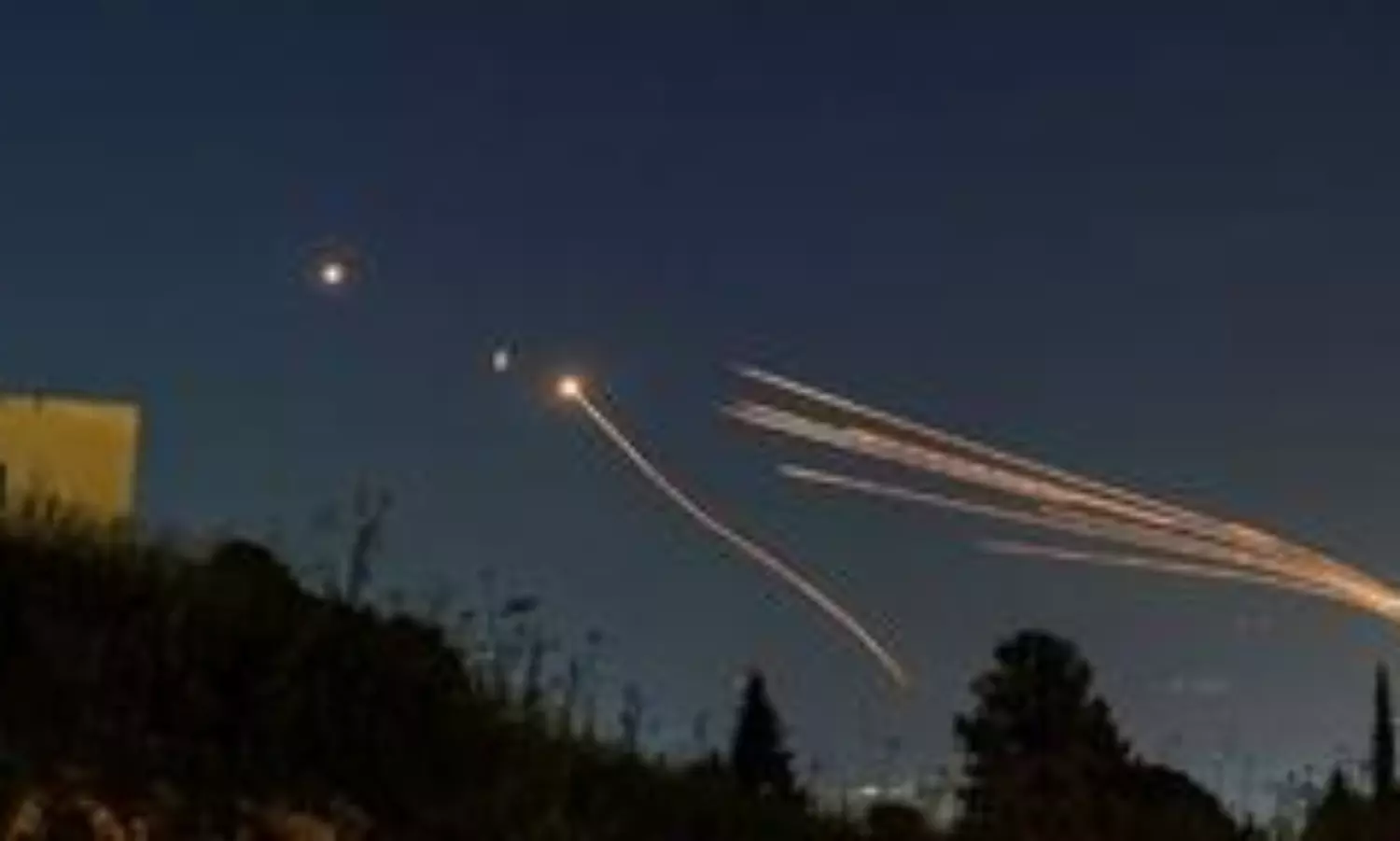 8 injured as Hezbollah fires 200 rockets at northern, central Israel