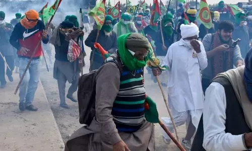 Haryana Police fires teargas shells to stop farmers march at Shambu border