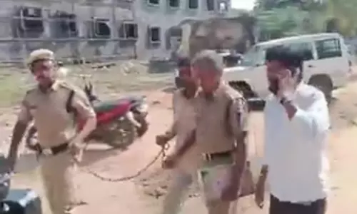 Jail official suspended for taking farmer to hospital in handcuffs in Telangana