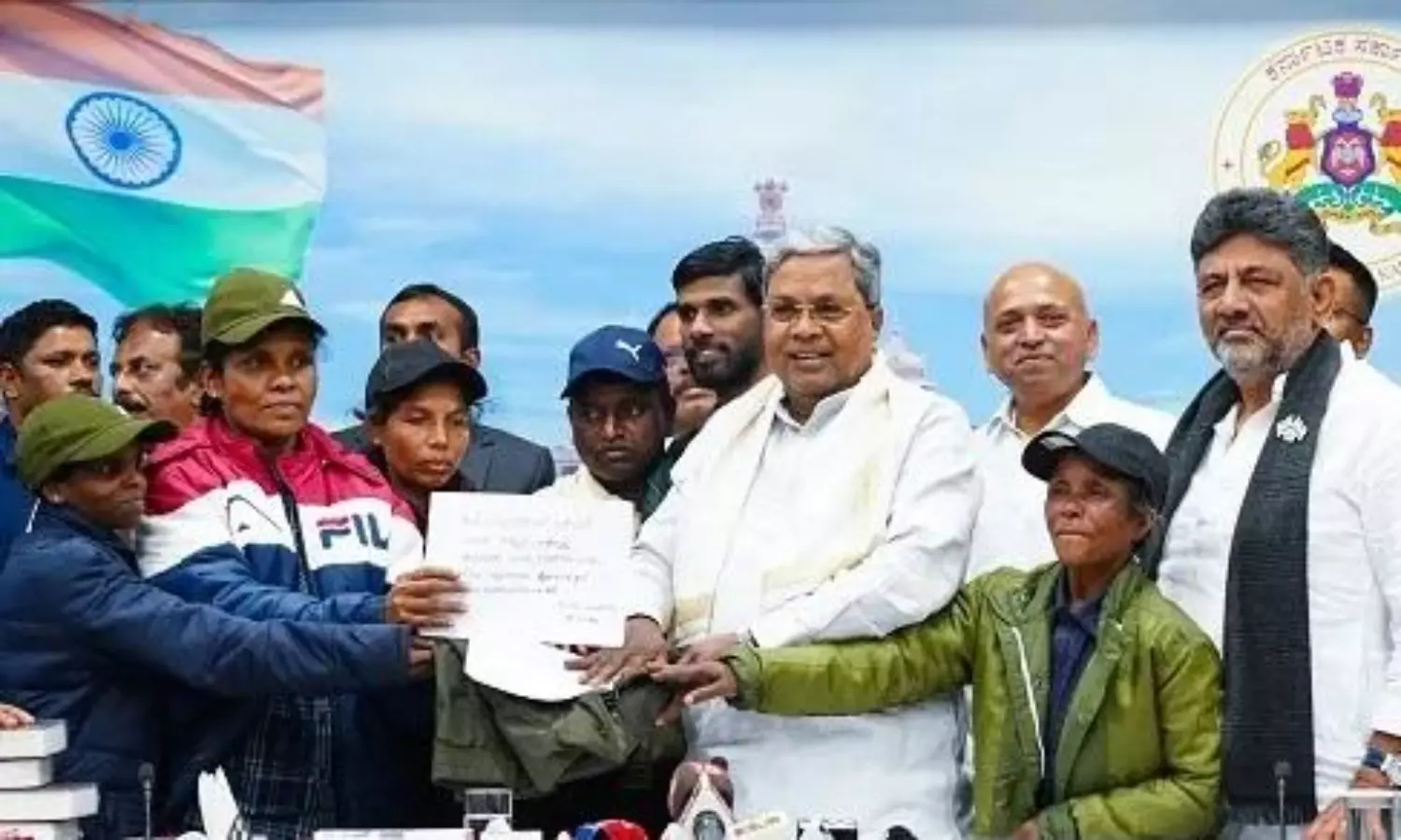 Karnataka CM welcomes surrendered Maoists with roses, constitution copies