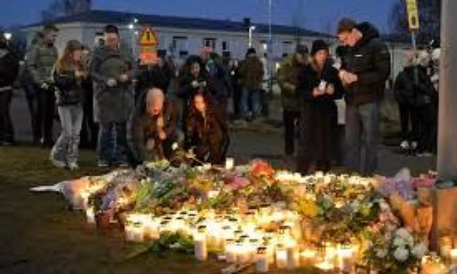 mass shooting in Orebro vigil