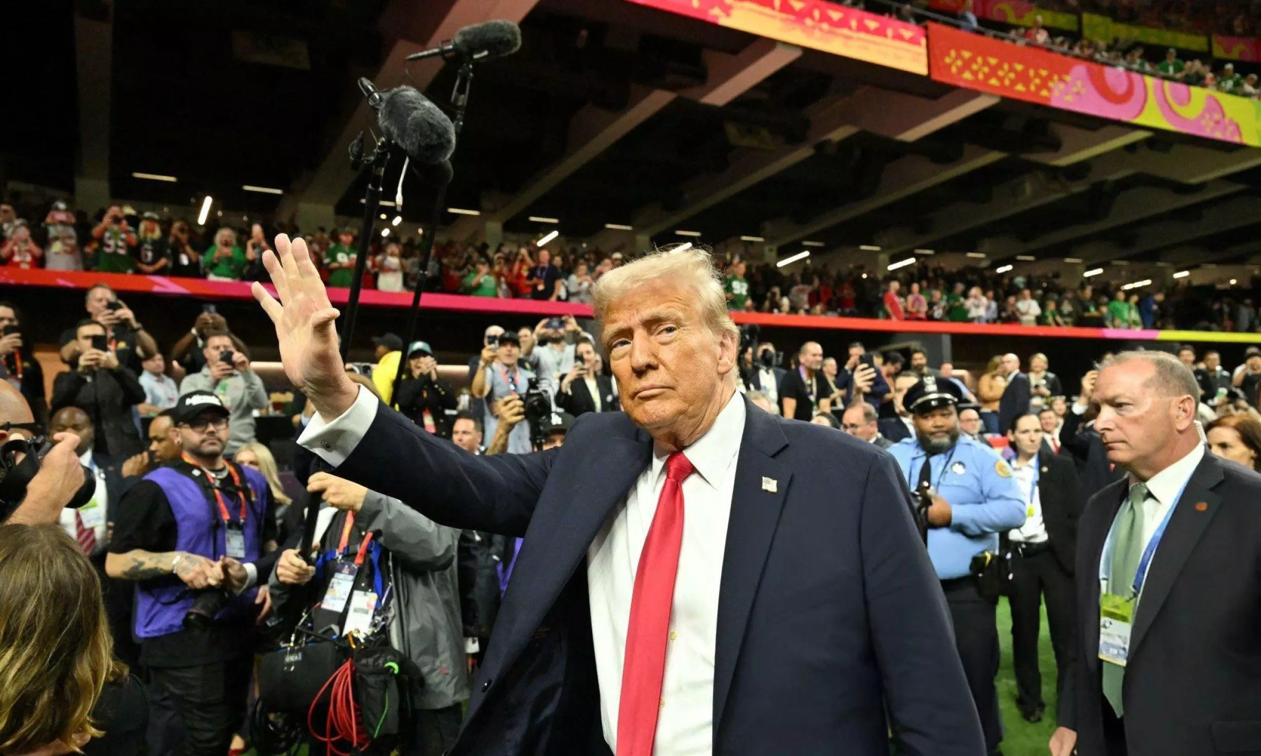Trump attends Super Bowl amid complex relationship with football