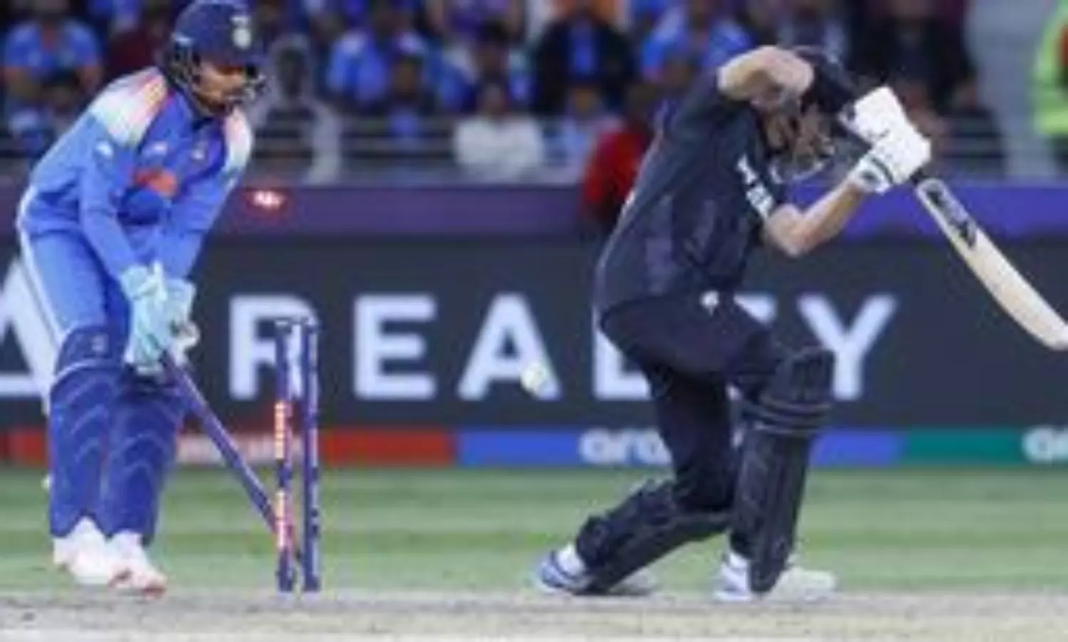 Chakaravarthy’s fifer helps India advance to semis against Australia