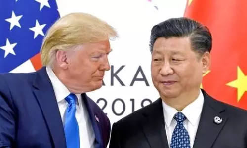 China imposes up to 15% tariffs on US farm products in retaliatory measure