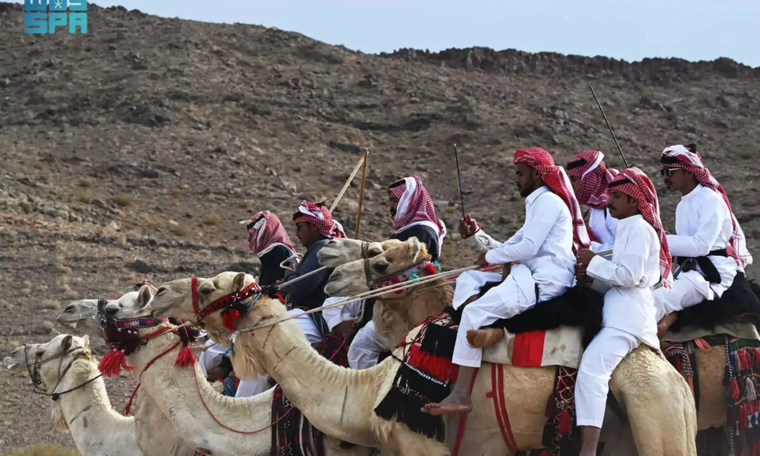 Tabuk camel riders celebrate Eid with traditional Al-Hijini rhythms