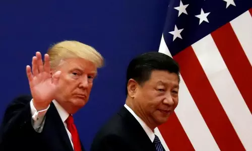 China reciprocates with 34% tariffs on US products day after Trump’s tariff order