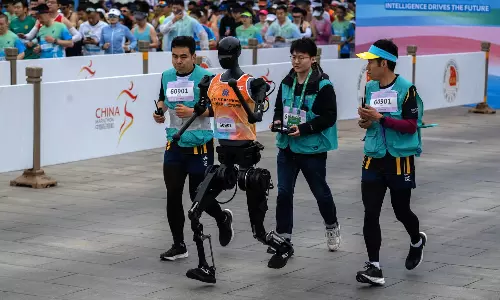 Humanoid robots race alongside humans for the first time in China