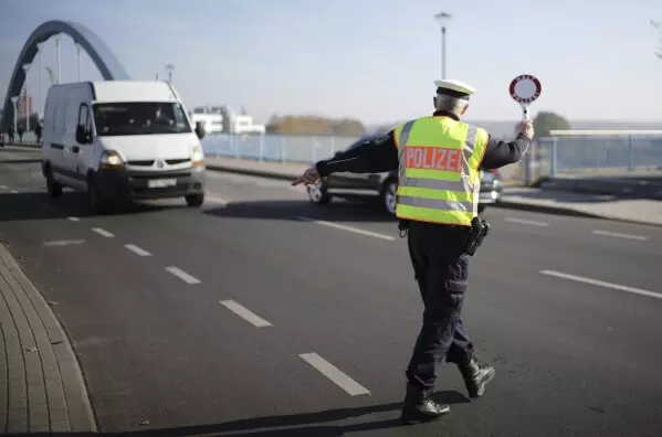 Poland reinstates border controls with Germany, Lithuania to stop asylum-seekers