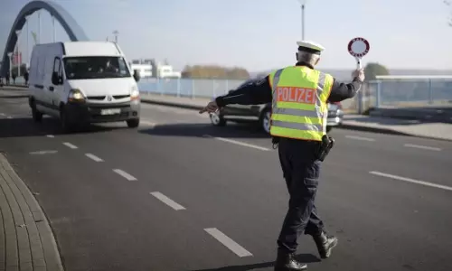 Poland reinstates border controls with Germany, Lithuania to stop asylum-seekers