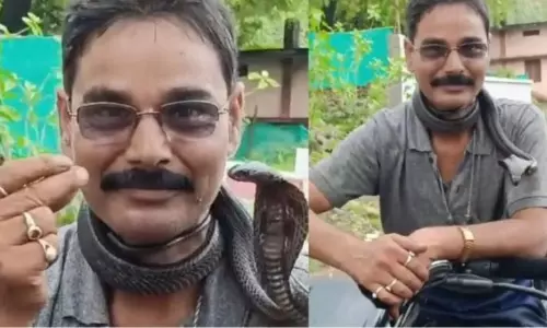 Snake catcher in MP riding bike with snake around neck dies after bite