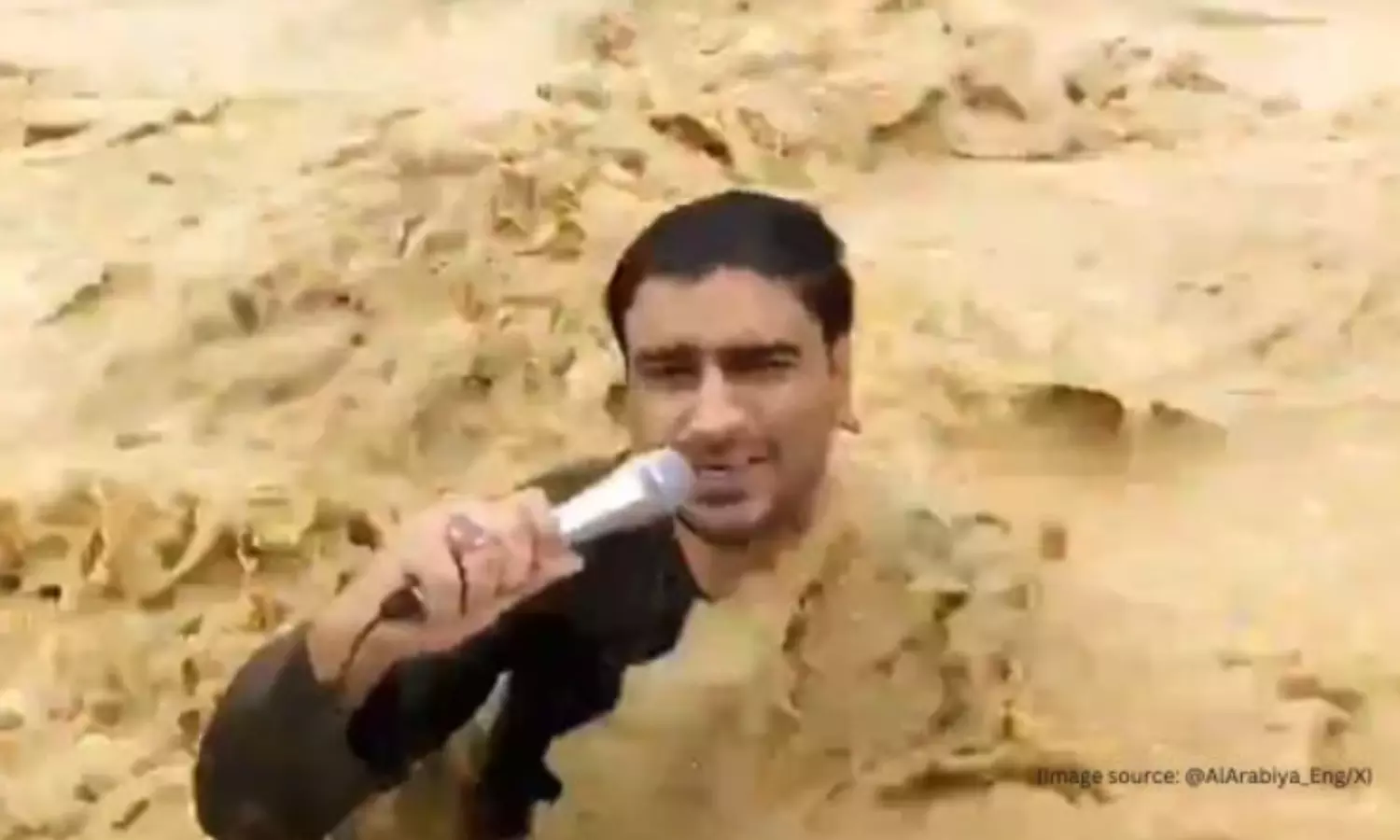 Harrowing video! Flood waters sweep away Pak news reporter!!