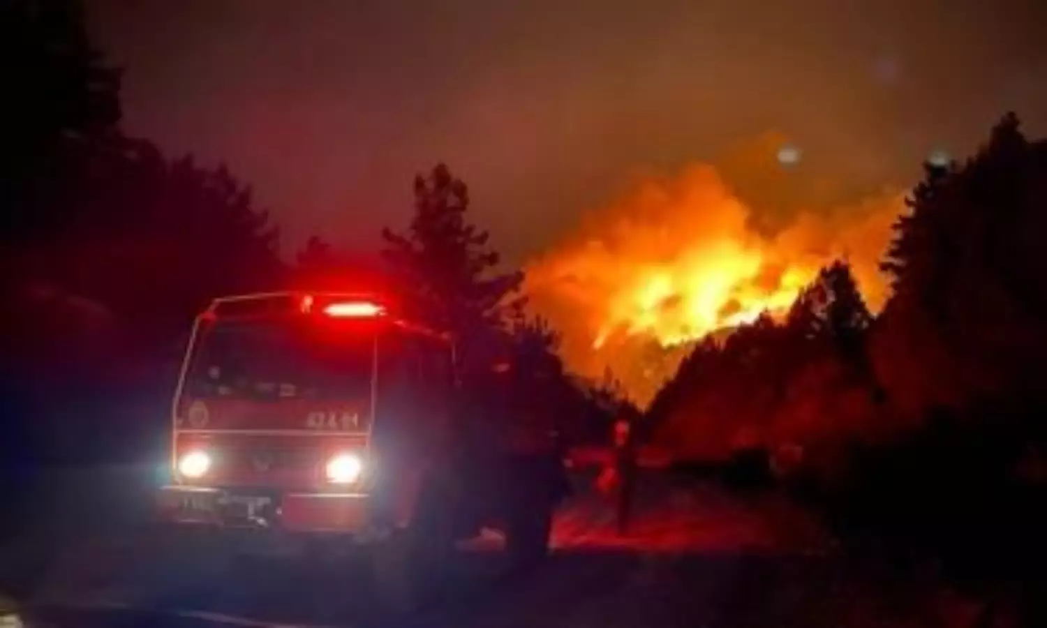 Mass evacuations from villages as two major wildfires rage in Turkey