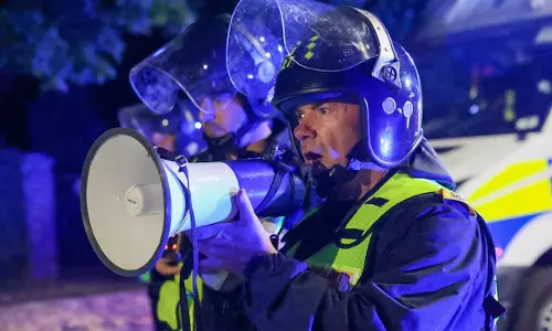 UK plans social media monitoring squad to track anti-migrant posts