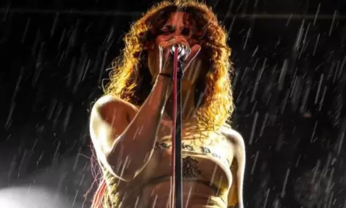 Sexually assaulted at concert, singer Rebecca Baby goes topless in protest