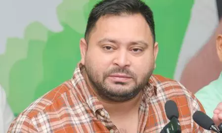 Tejashwi Yadav alleges two NDA leaders hold duplicate voter IDs, questions EC’s neutrality