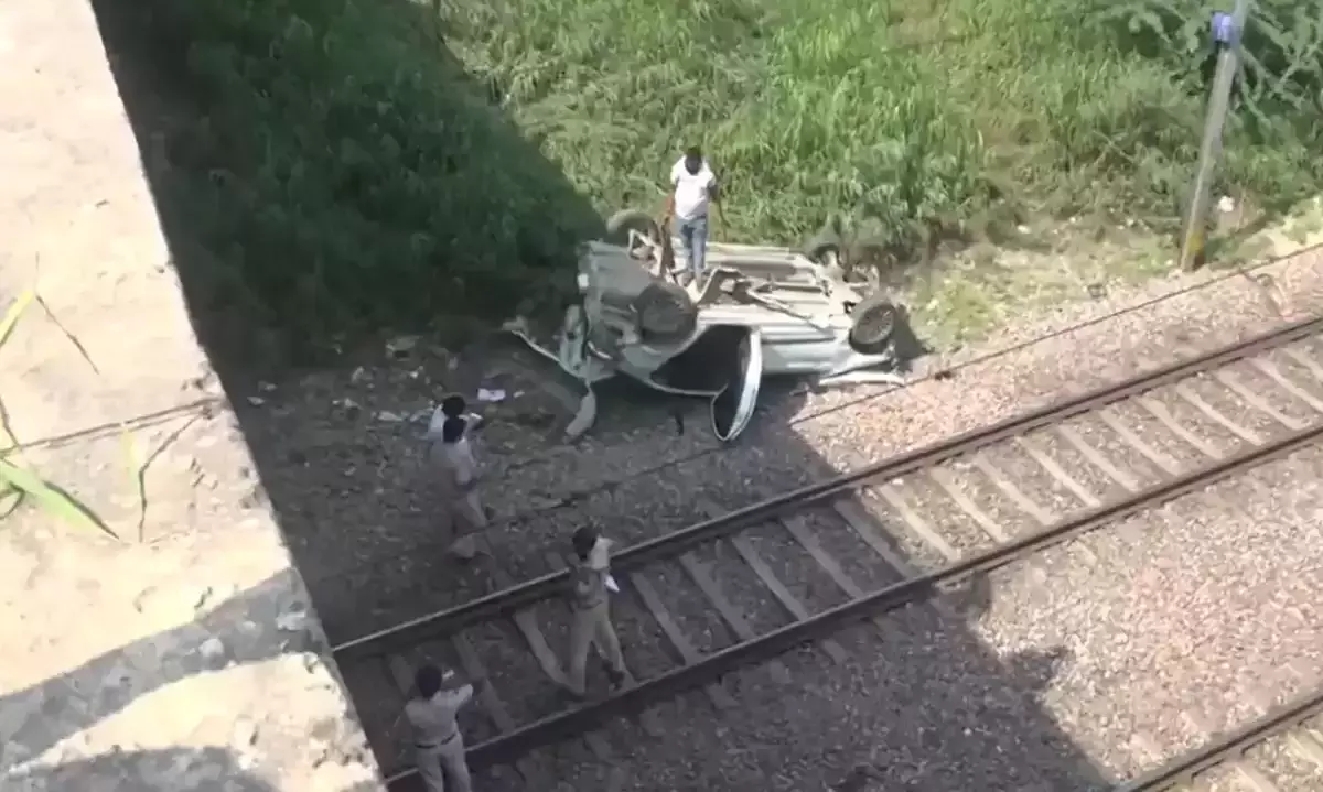 Car plunges from flyover onto Delhi railway tracks; driver escapes