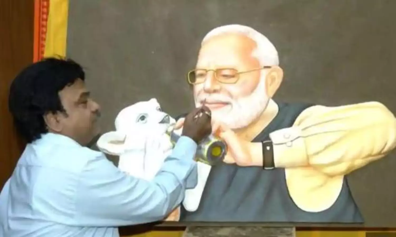 Rajasthan artist greets PM Modi with cow-dung painting on birthday