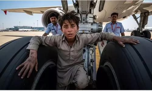 13-yr-old Afghan boy survives flight to Delhi hidden in plane’s landing gear