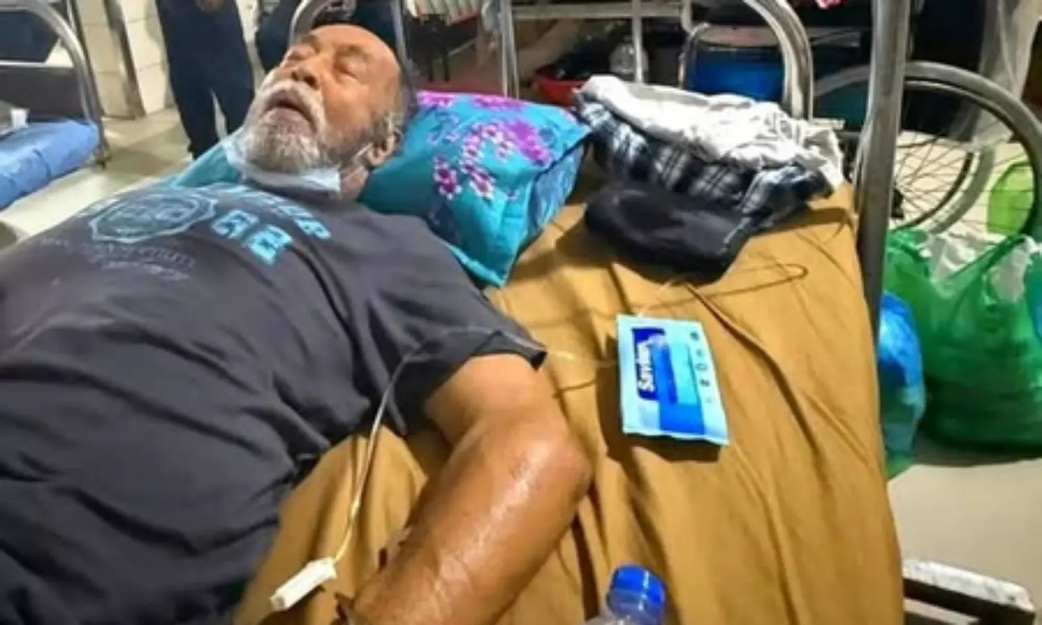 Outcry in Bangladesh after photos show ex-minister handcuffed to hospital bed before death