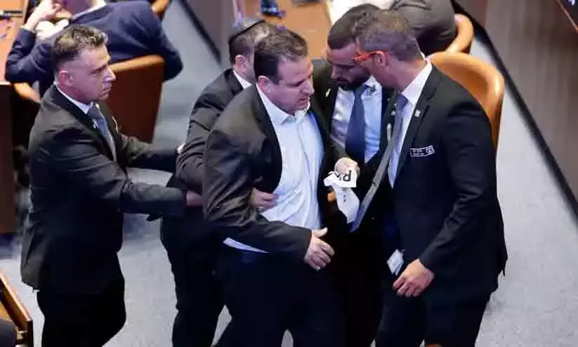 2 Israeli parliament members protest, disrupt Trumps address