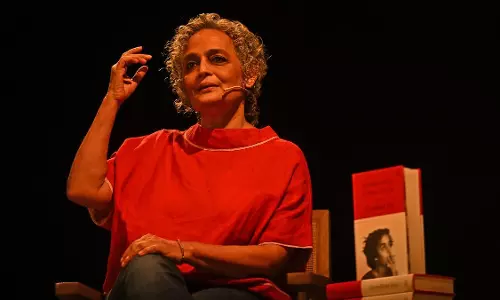Kerala HC rejects PIL against Arundhati Roy’s book cover depicting smoking