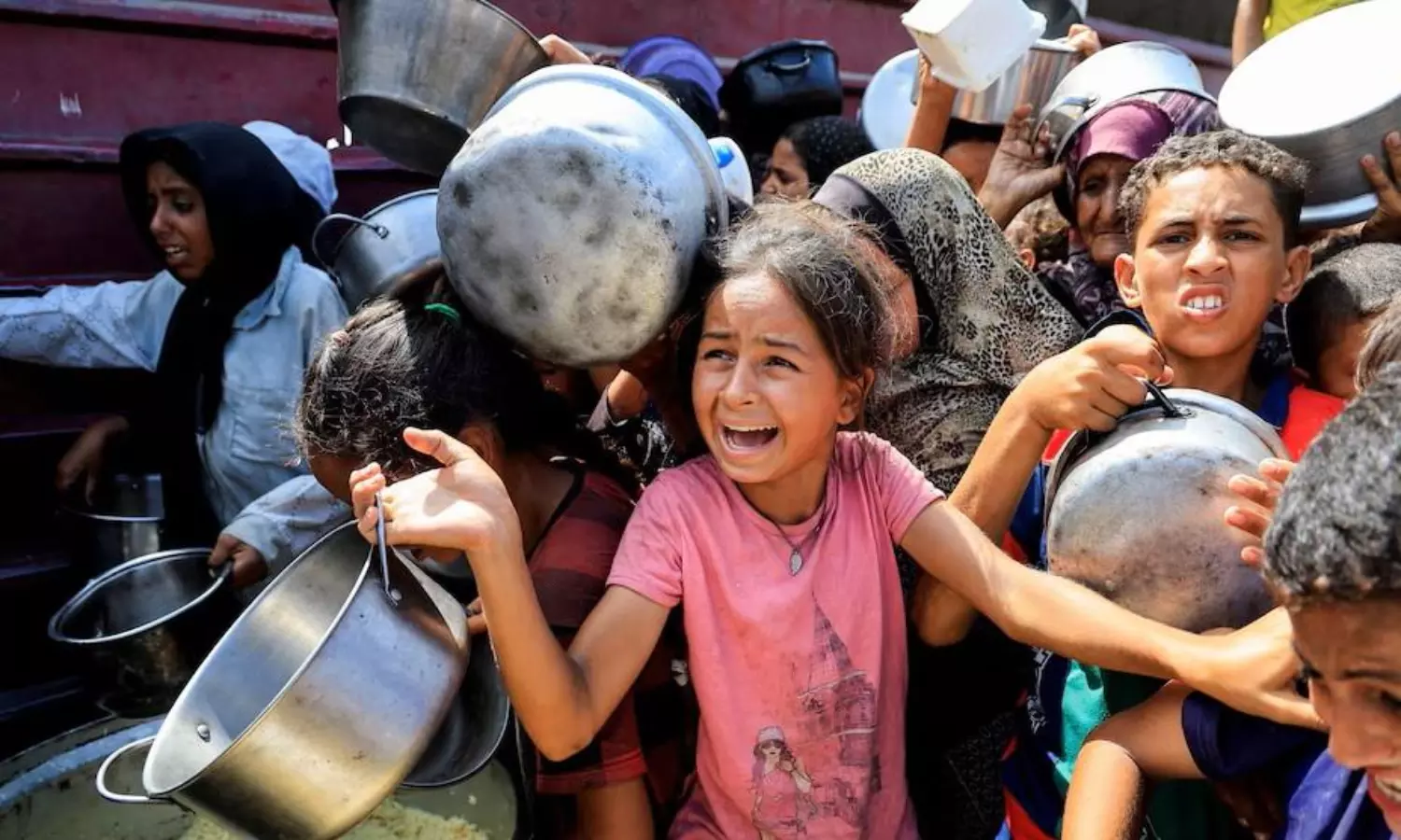 US boasts of aid affluence, aid groups refute, Palestinians call it engineered starvation